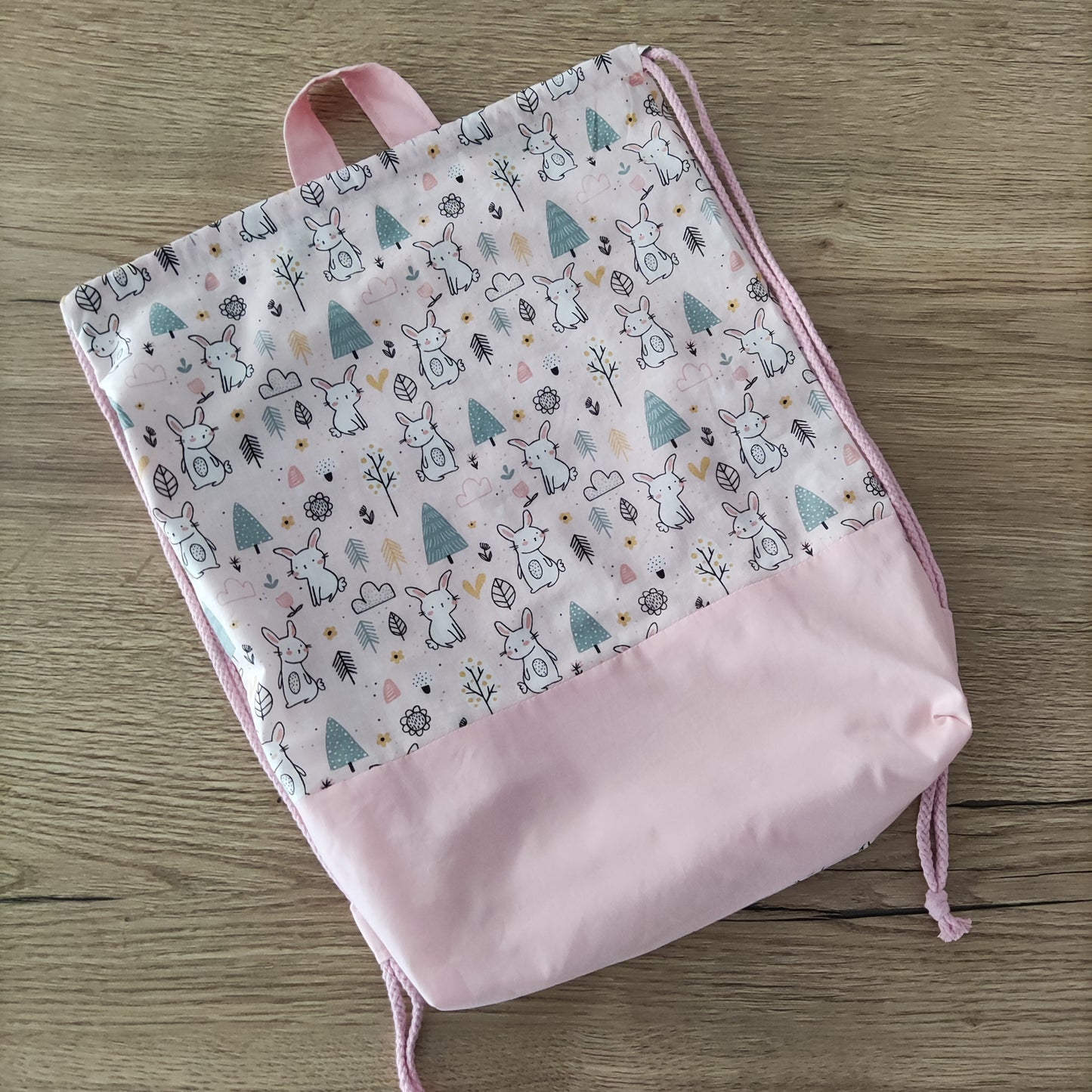 Sacca zainetto con coniglio rosa