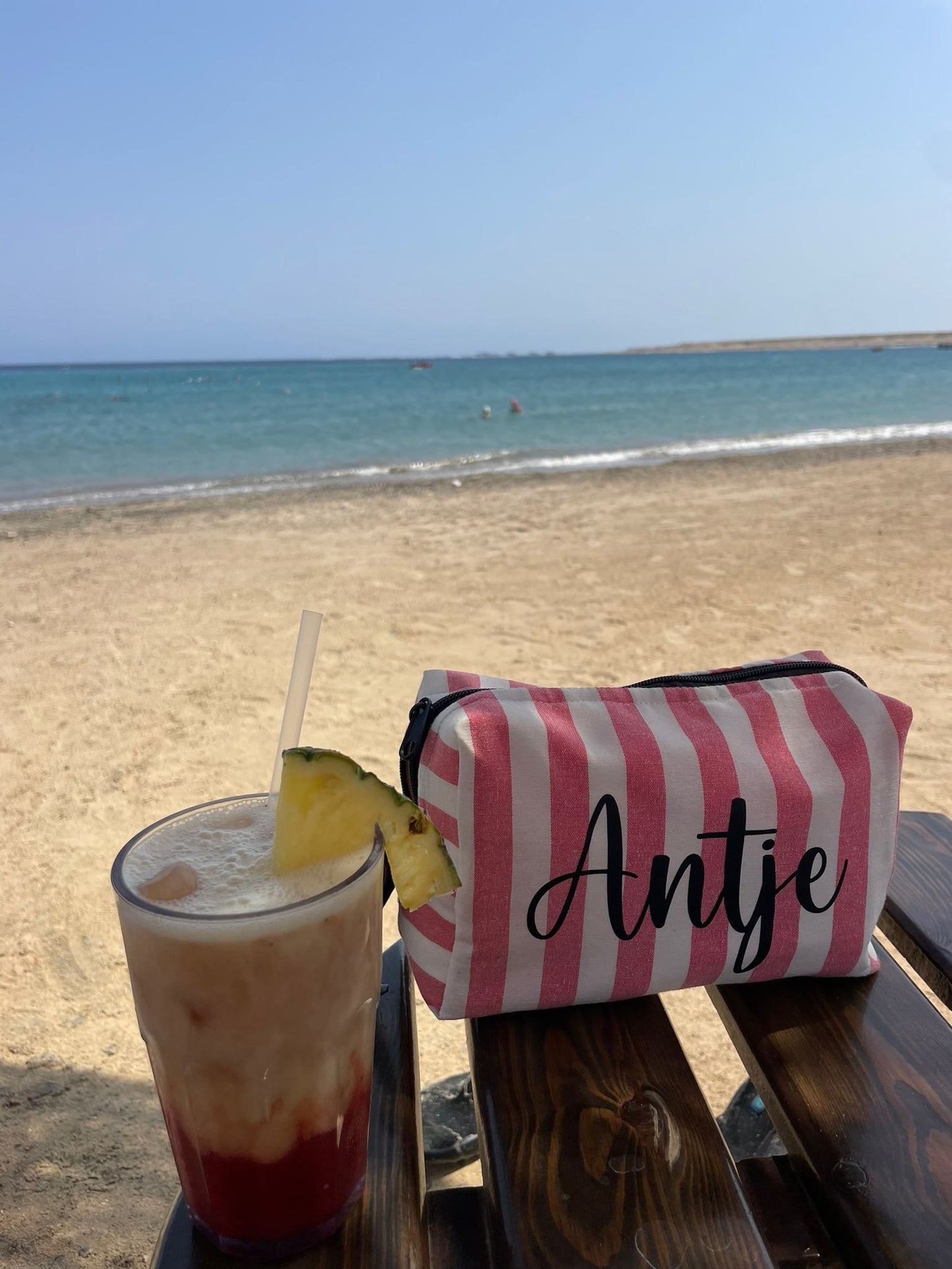 Pochette a righe con nome