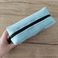 Pochette in spugna con iniziali ricamate