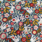 Tovaglietta con coniglietti e fiori rosa base blu trapuntata