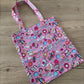 Borsa shopper rosa con disegni