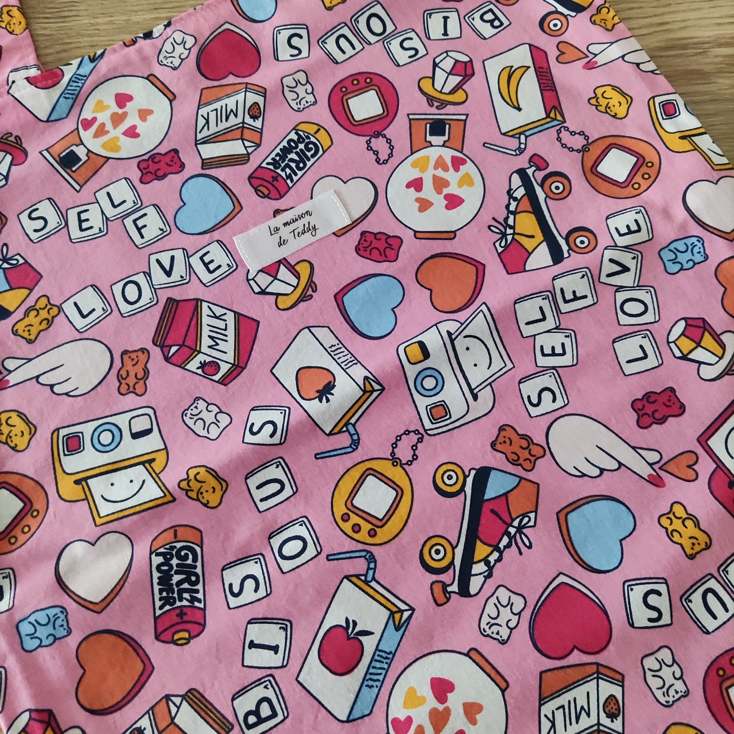 Borsa shopper rosa con disegni