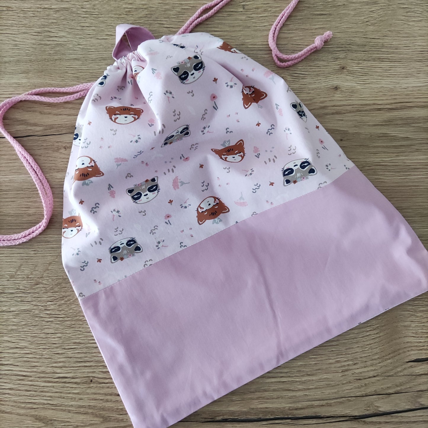 Sacca asilo - Volpine e procioni rosa