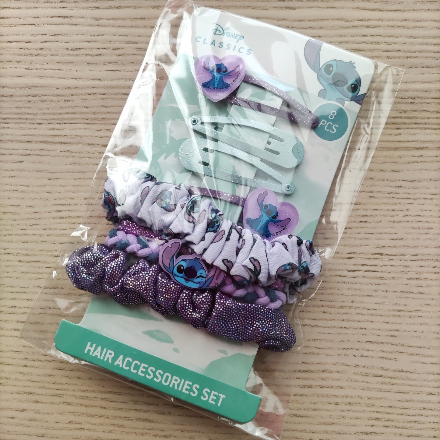 Pochette Stitch rosa piatta misura media