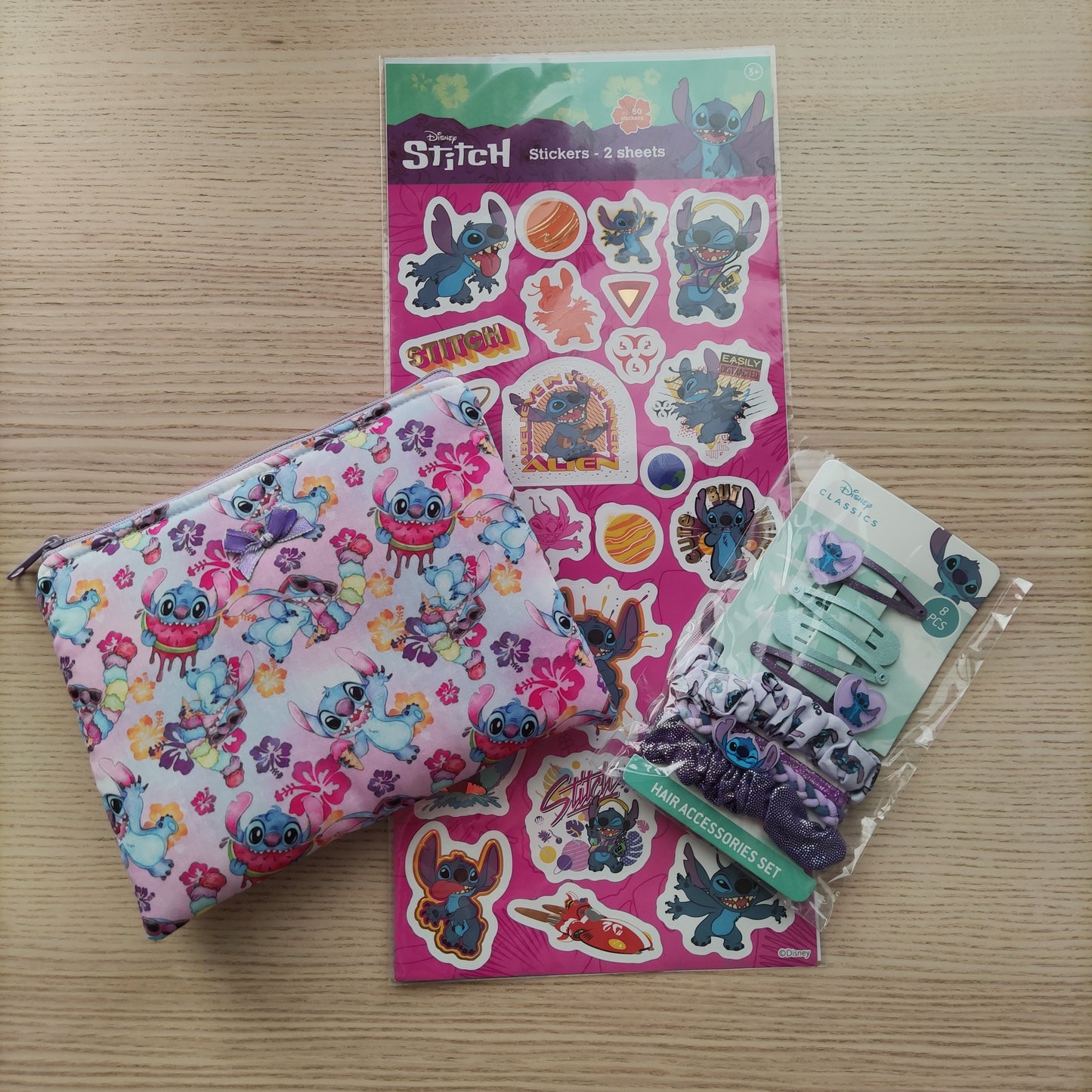 Pochette Stitch rosa piatta misura media